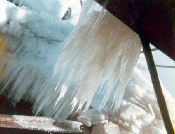 Icicles hang from the lighthouse main deck